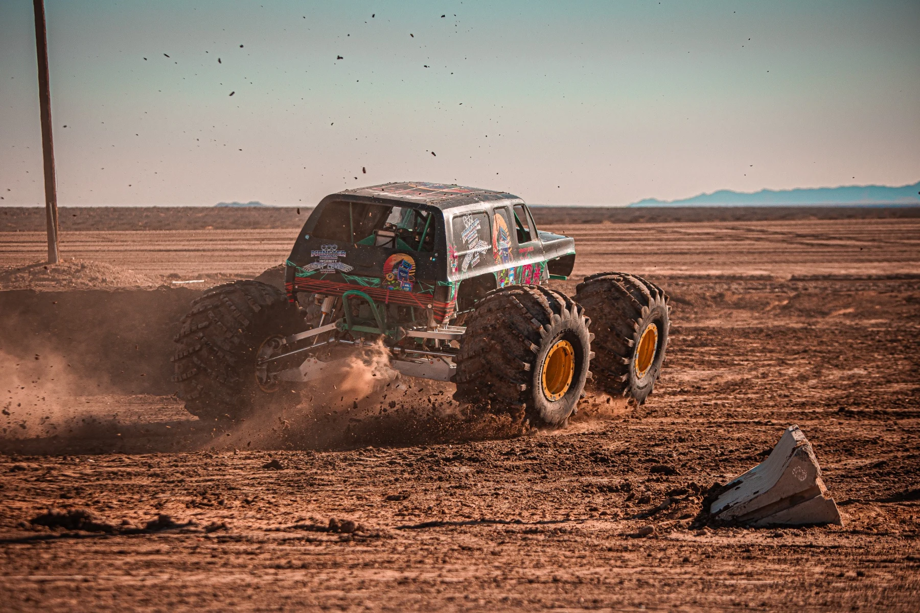 Monster truck action on dirt