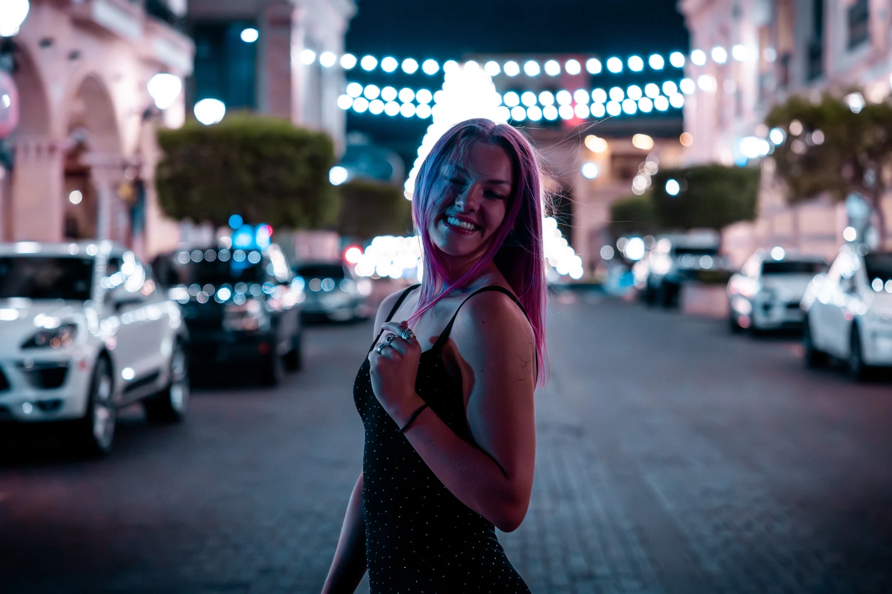 Night portrait with colorful city lights